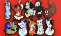 An old set of PVC character charms including Augustus.